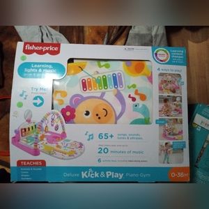 Fisher Price kick and play deluxe piano